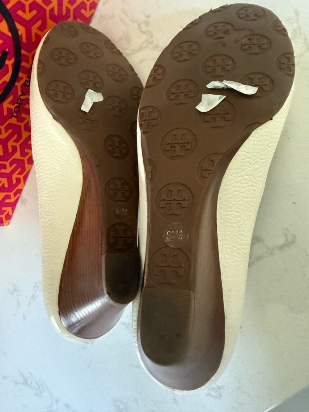 Tory Burch Ivory Textured Leather Wedge Pumps with Logo Medallion - Picture 3 of 6